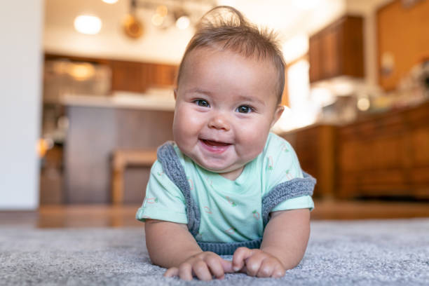 Cute baby on carpet floor | Endwell Rug & Floor