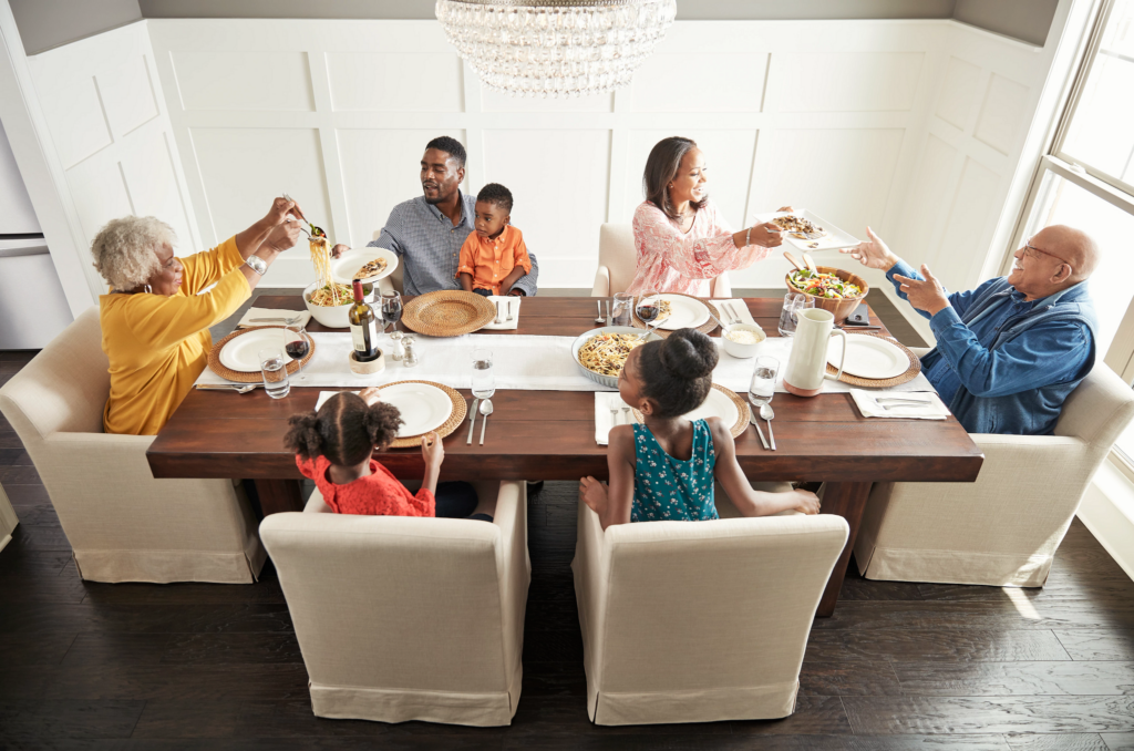 Family enjoys meal | Endwell Rug & Floor